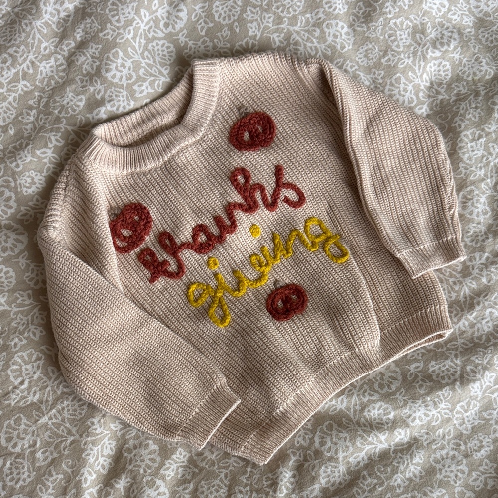 Amazon Beige Sweater with Red and Yellow Embroidery